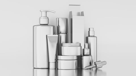 collection of silver skincare and cosmetic containers and bottles displayed on a smooth surface, highlighting modern and sleek packaging design in a clean setting. 3d render.